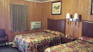 Posteľ alebo postele v izbe v ubytovaní Texas Inn Motel