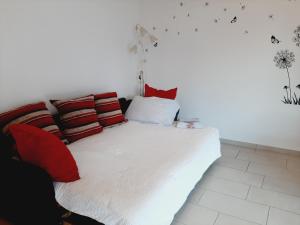 Postel nebo postele na pokoji v ubytování San Giulio Roveredo
