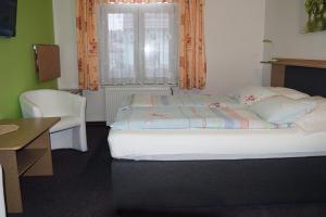 Letto o letti in una camera di Penzion Jordán
