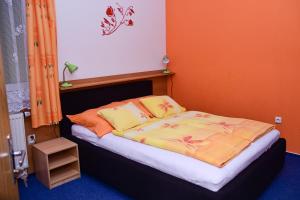 Letto o letti in una camera di Penzion Jordán