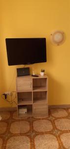TV a/nebo společenská místnost v ubytování Casa vacanze Perfecta Laetitia Assisi