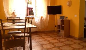 TV a/nebo společenská místnost v ubytování Casa vacanze Perfecta Laetitia Assisi