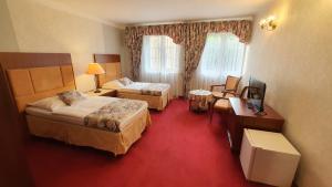 Postel nebo postele na pokoji v ubytování Eurohotel