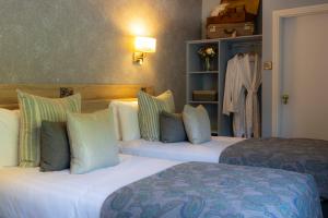 Katil atau katil-katil dalam bilik di Eccles Hotel and Spa