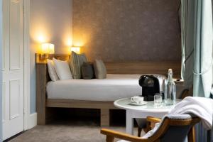 Katil atau katil-katil dalam bilik di Eccles Hotel and Spa
