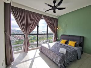 Astetica Residences 200mbps Wifi Netflix客房内的一张或多张床位