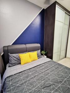 Astetica Residences 200mbps Wifi Netflix客房内的一张或多张床位