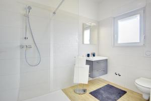 Kúpeľňa v ubytovaní Villa Buzdonka