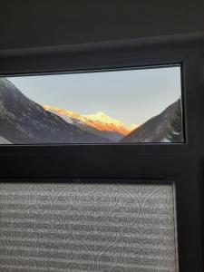 Nespecifikovaný výhled na hory nebo výhled na hory při pohledu z apartmánu