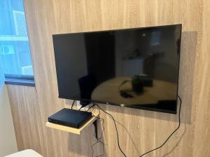 TV a/nebo společenská místnost v ubytování 自由自在OSU 402(KUMO)