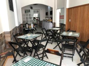 ห้องอาหารหรือที่รับประทานอาหารของ Pousada Suítes Do Pelô