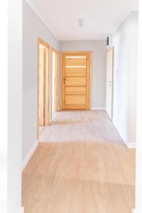 Posteľ alebo postele v izbe v ubytovaní AL-DOM apartamenty Apartament Stjarne w spokojnej okolicy