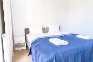 Posteľ alebo postele v izbe v ubytovaní AL-DOM apartamenty Apartament Stjarne w spokojnej okolicy