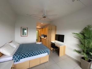Ein Bett oder Betten in einem Zimmer der Unterkunft Rayong Condochain by Rick