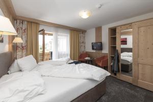 Posteľ alebo postele v izbe v ubytovaní Aktiv-Hotel Traube
