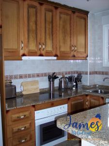 Een keuken of kitchenette bij Playa Golf R4 Lovely quad house with communal pool P245