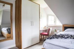 Кровать или кровати в номере Holiday house, Fuhlendorf