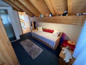 Letto o letti in una camera di Alpenparadies