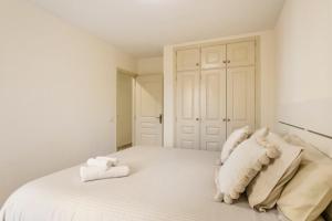 Postel nebo postele na pokoji v ubytování Confortable Apartment Paraiso del Palm Mar + 33 fotografií