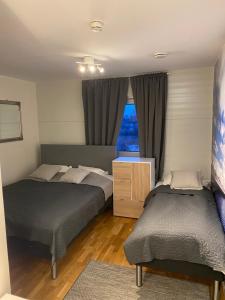 Postel nebo postele na pokoji v ubytování Hotell TunaPark