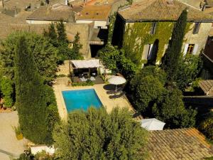 an overhead view of a house with a swimming pool at Mas Tolosan in Vauvert