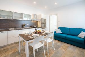 A kitchen or kitchenette at Residenza Ai Ferrari