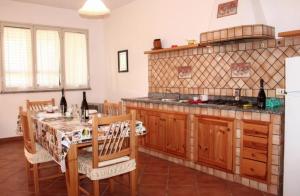 A kitchen or kitchenette at Case dell' Acqua