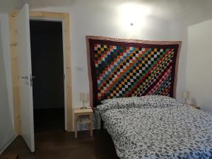 Postel nebo postele na pokoji v ubytování Cantina Alpina