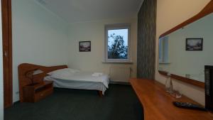 מיטה או מיטות בחדר ב-HRS Relax RSW
