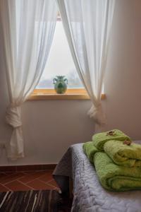 Postel nebo postele na pokoji v ubytování Ružas