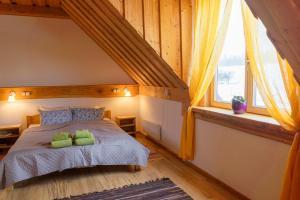 Postel nebo postele na pokoji v ubytování Ružas + 26 fotografií