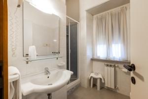 Koupelna v ubytování Hotel Nuova Grosseto + 37 fotografií