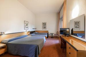 TV a/nebo společenská místnost v ubytování Hotel Nuova Grosseto