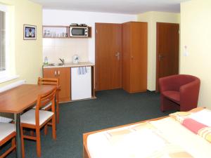Kuchyň nebo kuchyňský kout v ubytování Apartmány Family Veľký Meder