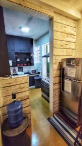 a kitchen with a large kitchen with a large oven at Rio Deal Guest House in Rio de Janeiro