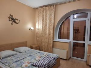 A bed or beds in a room at Villa "Marina"