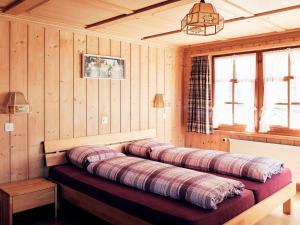 Llit o llits en una habitació de Gasthaus Hof