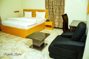 Havilah Towers Hotel Ltd客房内的一张或多张床位