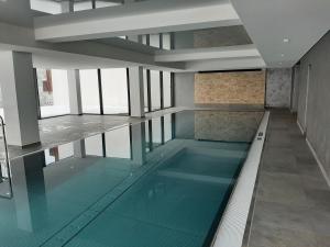an empty swimming pool in a building at Apartment Anja in Schluchsee