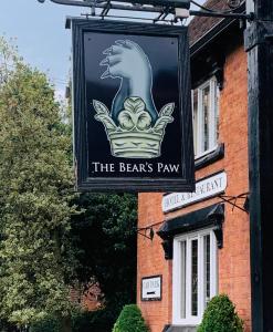 a sign for the beavers pay on the side of a building at Fantastic Location, Annexe with Hot Tub in Warmingham