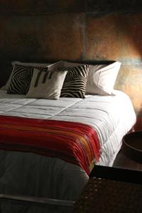 Postel nebo postele na pokoji v ubytování Excelente quarto com cama de casal king em casa perto do aeroporto de Curitiba