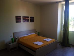 Postel nebo postele na pokoji v ubytování My Room Roma