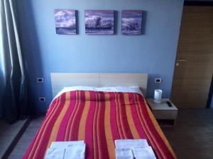 Postel nebo postele na pokoji v ubytování My Room Roma