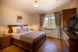 Posteľ alebo postele v izbe v ubytovaní Villa Terrarossa - Luxury Istrian Villa near Poreč