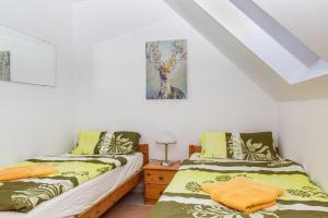 Posteľ alebo postele v izbe v ubytovaní Familia Apartment 152C