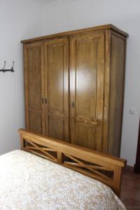 Łóżko lub łóżka w pokoju w obiekcie Casa Manolito