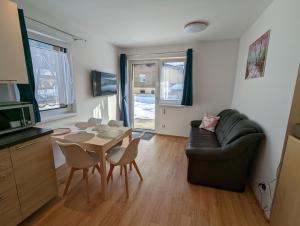 TV a/nebo společenská místnost v ubytování Appartment Dutzler