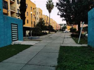 an empty street in front of some buildings at ¡Confortable y Privado! - Ubicado en Av. principal in Guadalajara