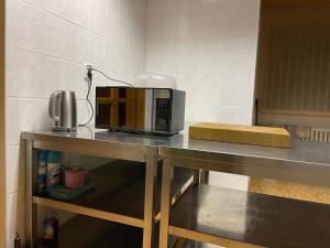 A kitchen or kitchenette at Apartmán na hranici