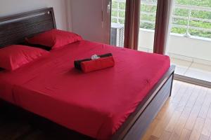 Letto o letti in una camera di Le Lis Vacances et Affaire Cosy vue Mer